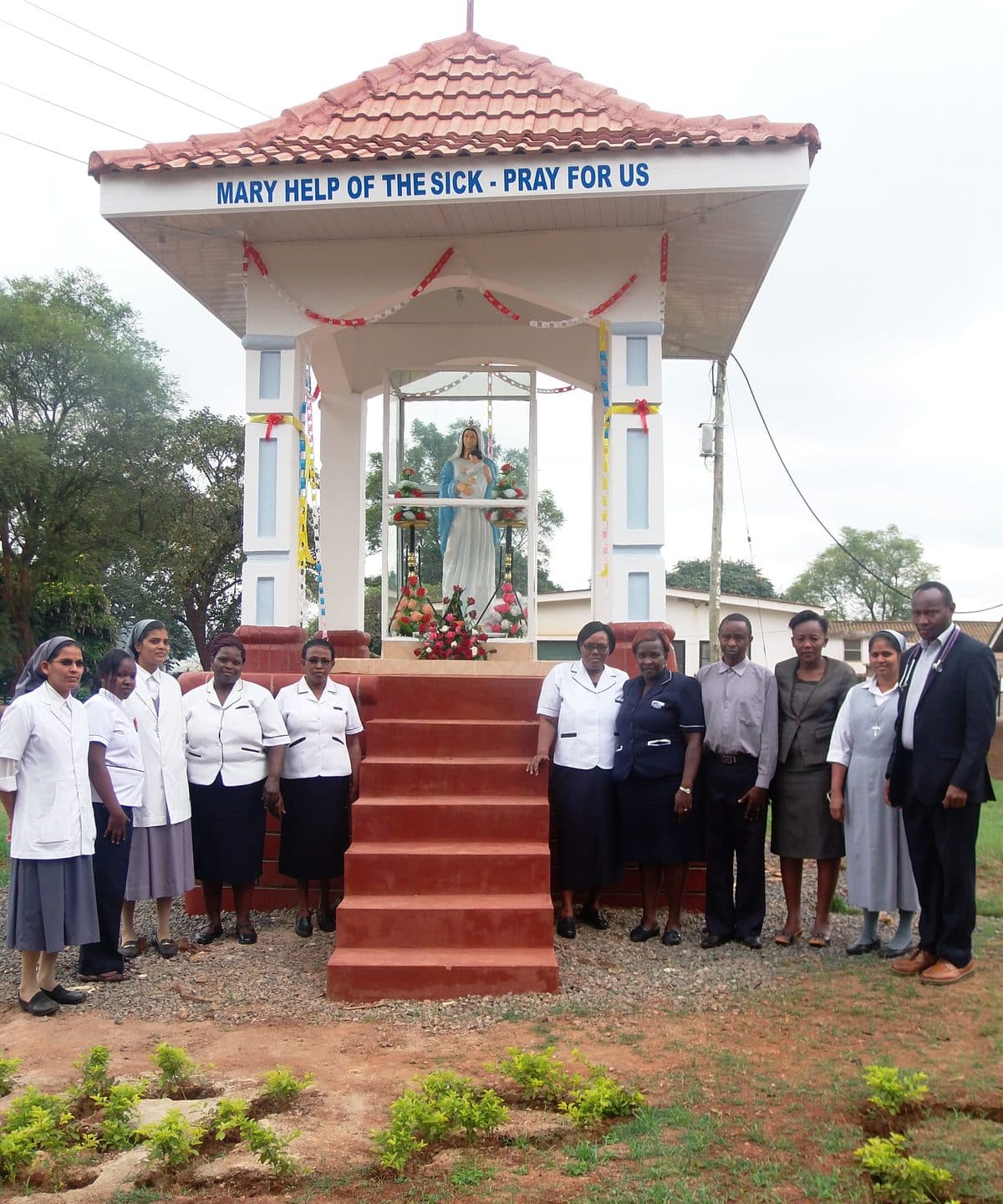 Sisters and staff at the Marian grotto