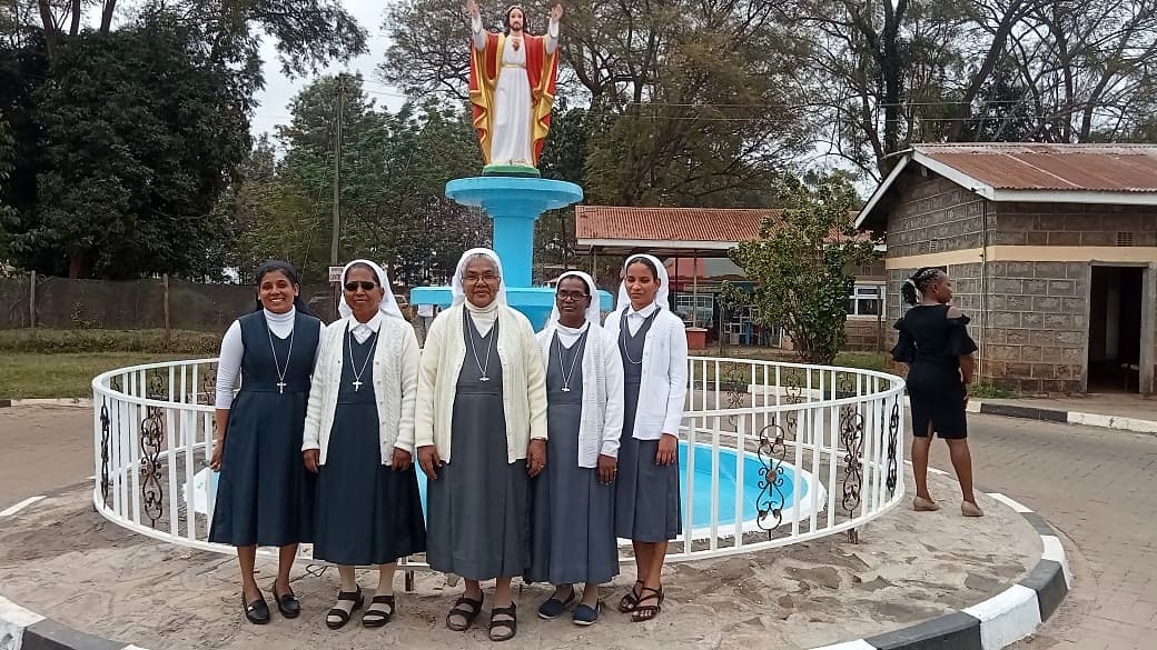 Sisters of the Salesian Missionaries of Mary Immaculate at the Sacred Heart fountain in the hospital grounds